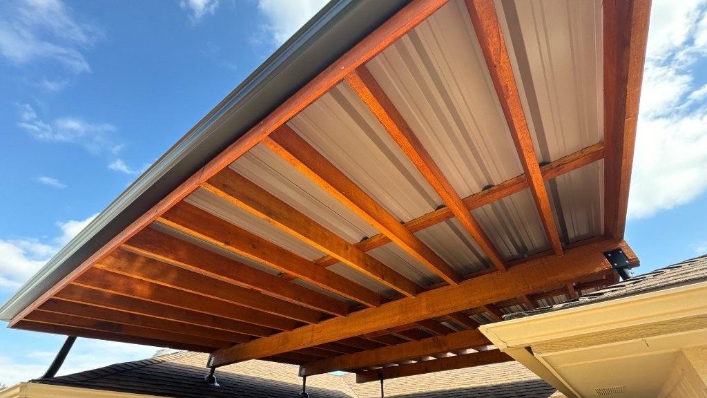 After: New roof and roof-mounted pergola – DFW Residence